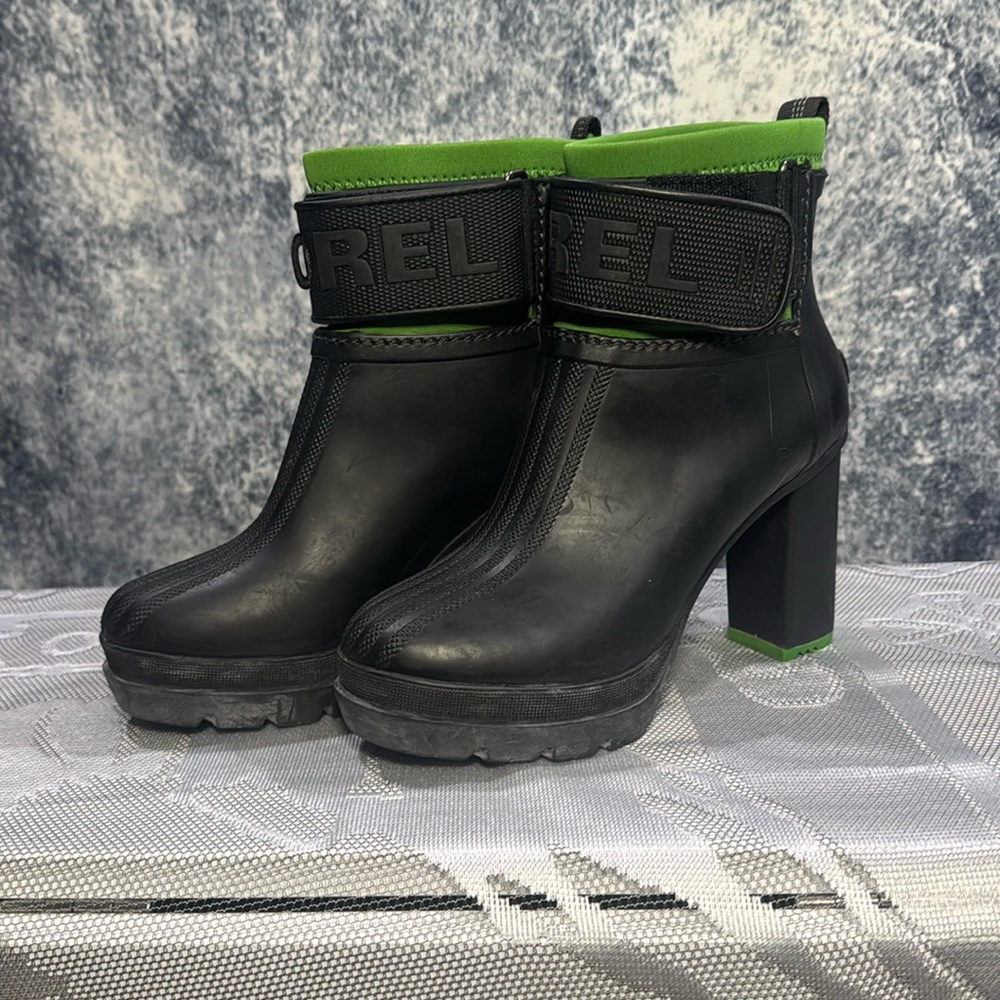 Sorel Medina III black rubber waterproof high heeled boot green accents neoprene